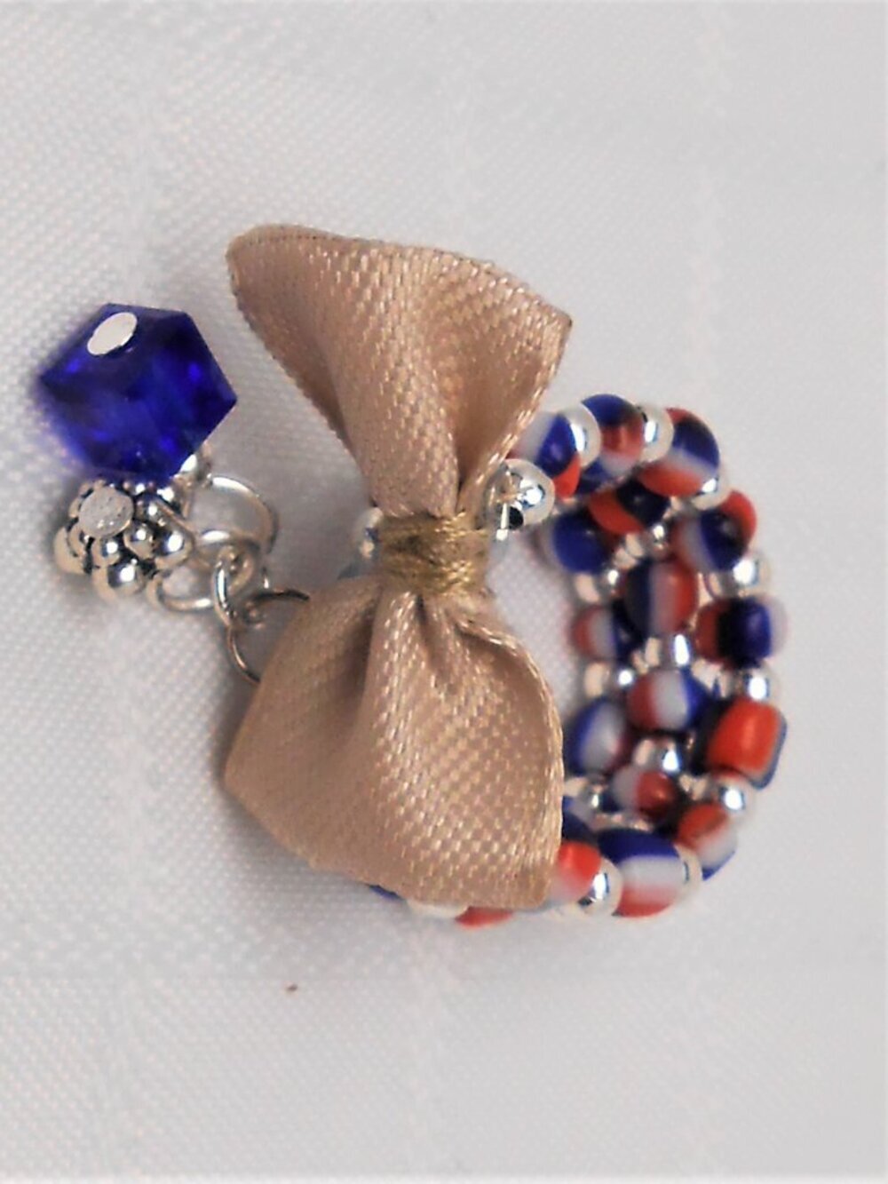No. 15 - Handmade memory wire ring with 2, 3, and 4 mm pearls